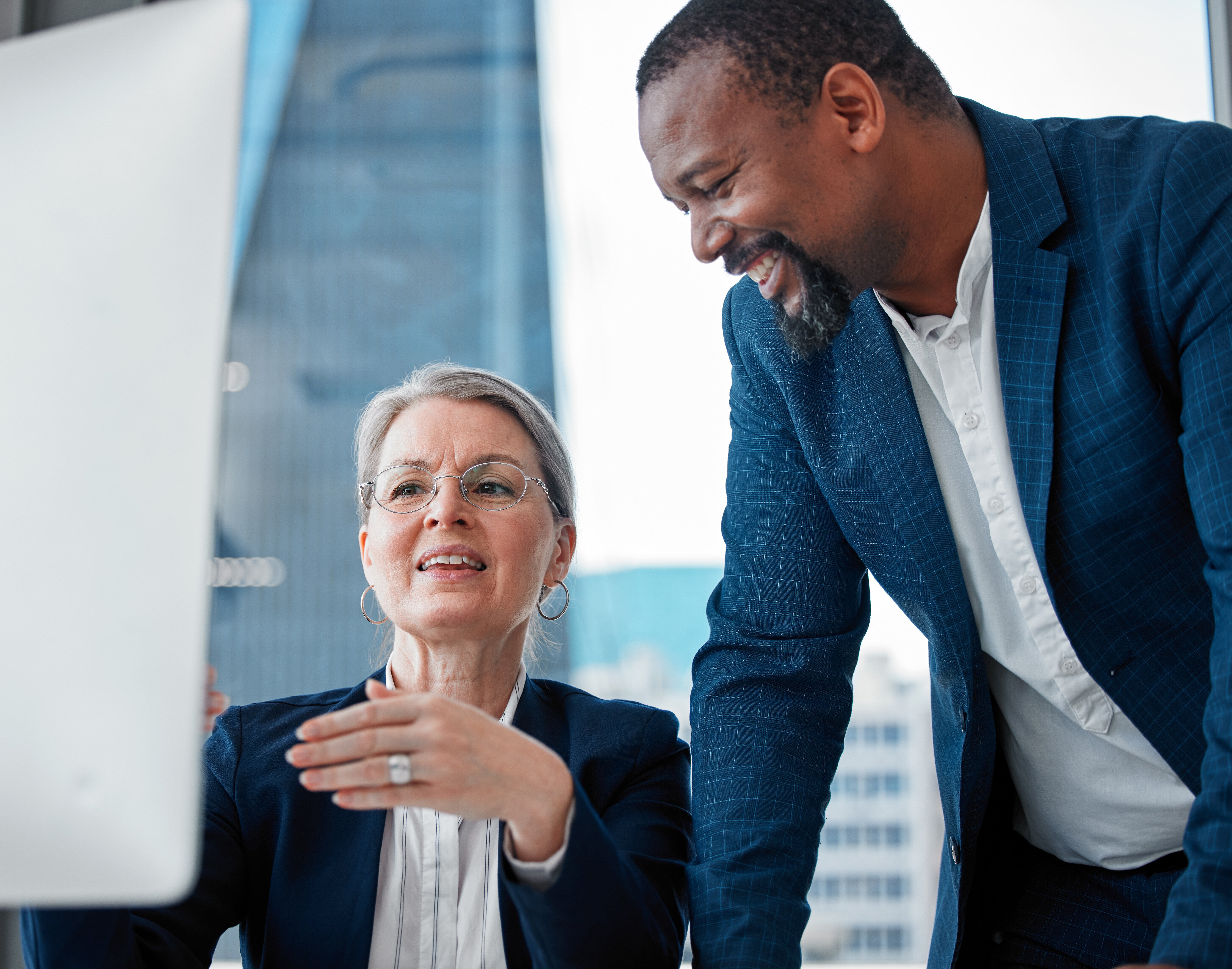 shot-of-two-businesspeople-having-a-discussion-in-2023-11-27-04-59-14-utc